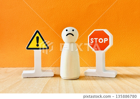 Stop caution sign and person Stop caution sign and person 135886780