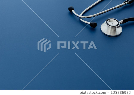 Stethoscope Blue background Medical image material 135886983