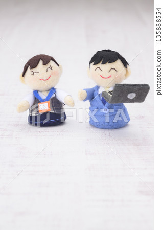 Businessman and office lady dolls Businessman and office lady dolls 135888554