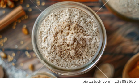 A jar of buckwheat flour showcasing its versatile use in both sweet and savory dishes A jar of buckwheat flour showcasing its versatile use in both sweet and savory dishes 135888699