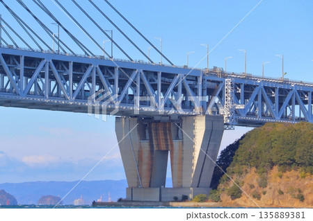 A train running under the Seto Ohashi Bridge (Seto Ohashi Line) A train running under the Seto Ohashi Bridge (Seto Ohashi Line) 135889381
