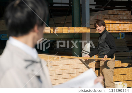 Men working in the lumber industry Men working in the lumber industry 135890334