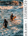 Morning and surfers 135890729