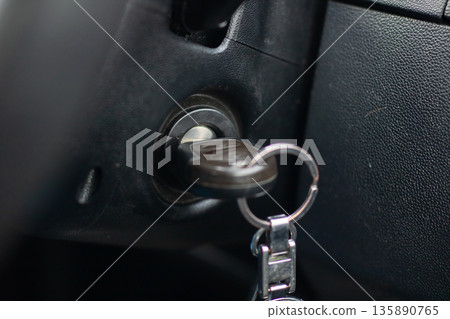 Key in ignition ready to go, Vehicle prepared for departure unveiling essential components 135890765