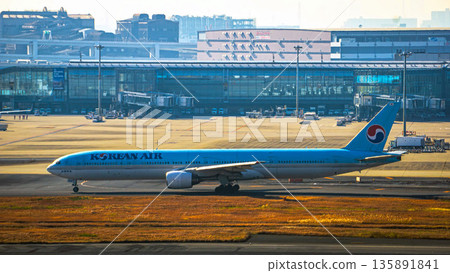 Korean Air passenger plane operating at Haneda Airport Korean Air passenger plane operating at Haneda Airport 135891841