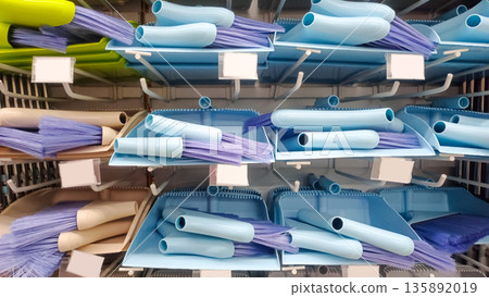 Small Blue Plastic Dustpan and Brush Sets for Quick Cleaning on Store Shelf 135892019