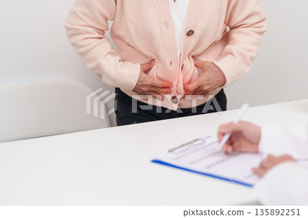 Elderly woman Patient consultation with doctor for Colon disease, Large Intestine, Colorectal cancer, Ulcerative colitis, Diverticulitis, Irritable bowel syndrome, Digestive system and Healthcare 135892251
