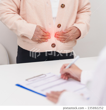 Elderly woman Patient consultation with doctor for Colon disease, Large Intestine, Colorectal cancer, Ulcerative colitis, Diverticulitis, Irritable bowel syndrome, Digestive system and Healthcare 135892252