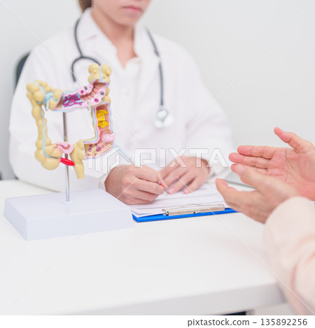 Elderly woman Patient consultation with doctor for Colon disease, Large Intestine, Colorectal cancer, Ulcerative colitis, Diverticulitis, Irritable bowel syndrome, Digestive system and Healthcare 135892256