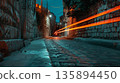 The ancient stone walls of a city brought to life by the vibrant trails of passing car headlights weaving through its narrow streets 135894450