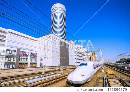 Yokohama cityscape in Japan: Inbound tourism continues... View of the Shinkansen and Yokohama Prince Hotel. Towards a future of rapid growth Yokohama cityscape in Japan: Inbound tourism continues... View of the Shinkansen and Yokohama Prince Hotel. Towards a future of rapid growth 135894579