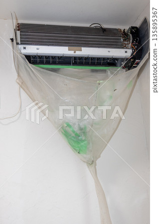 After removing and protecting parts during air conditioner cleaning After removing and protecting parts during air conditioner cleaning 135895367