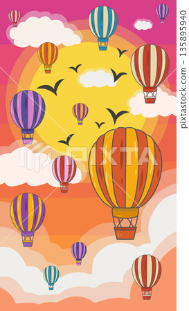 五彩繽紛的熱氣球在夕陽的天空中翱翔 135895940