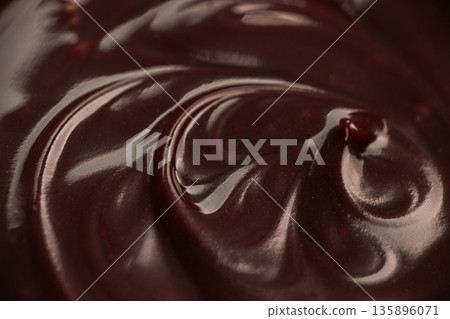 Glossy dark chocolate surface macro texture 135896071