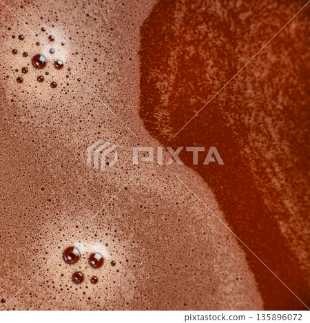 Hot chocolate foam macro texture background Hot chocolate foam macro texture background 135896072