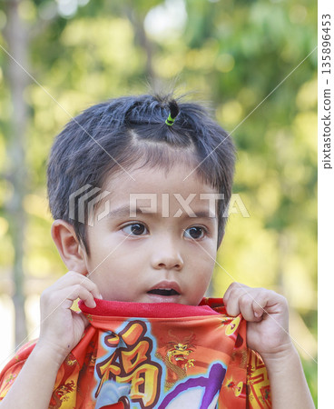 Portrait of Asian boy outdoor 135896453