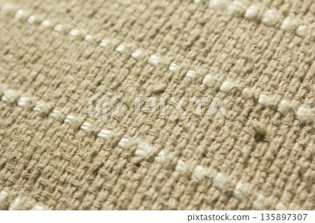 Close up of beige fabric 135897307