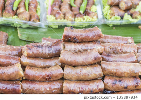 Northern Thai spicy sausage, grilled sausages at street food 135897934