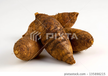 Fresh taro root brown tuber tropical vegetable organic food healthy ingredient rustic agriculture root crop clean background raw cooking natural 135898215