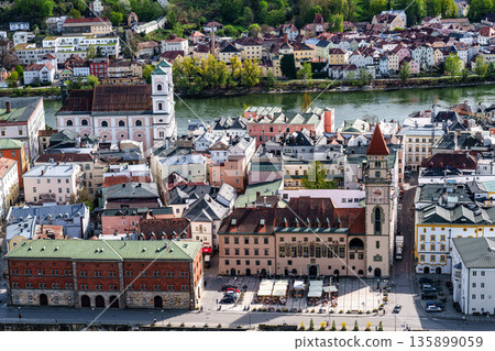 Passau, Germany - Apr 16, 2025: The town hall of Passau, Germany is located on Rathausplatz, near the banks of Danube 135899059