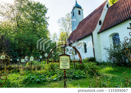 Church St.Clemens in Kranzberg with ancient graveyard and old wr Church St.Clemens in Kranzberg with ancient graveyard and old wr 135899067