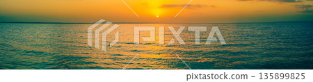 Sunset over the sea. Horizontal banner Sunset over the sea. Horizontal banner 135899825