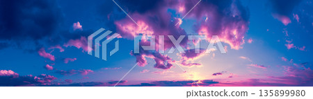 Blue-pink cloudy sky at sunset. Horizontal banner 135899980