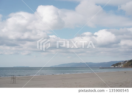 Sandy beach, blue sea and sky Sandy beach, blue sea and sky 135900545