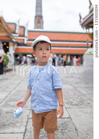Young Boy Captures Memories At Bangkok Temple With Miniature Camera 135900894