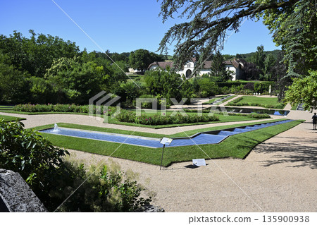 Garden of Chateau des Milandes, a manor house in the commune of Castelnaud-la-Chapelle Garden of Chateau des Milandes, a manor house in the commune of Castelnaud-la-Chapelle 135900938
