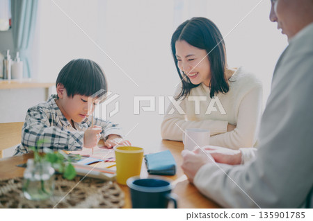 Family gathering in the dining room 135901785