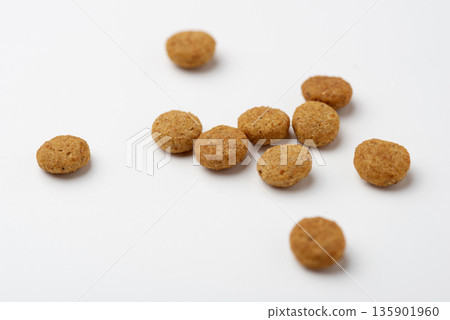 Dry pet food on a white background Dry pet food on a white background 135901960