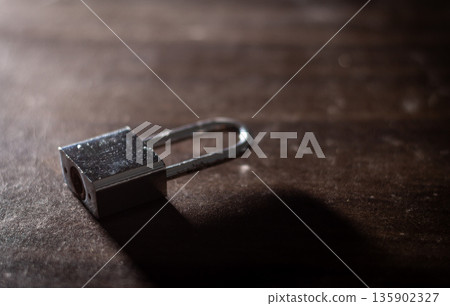 House keys left on an empty table symbolizing abandonment, separation, loneliness House keys left on an empty table symbolizing abandonment, separation, loneliness 135902327