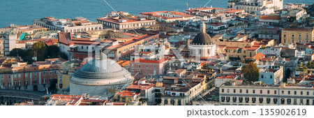 Naples, Italy. Top View Cityscape Skyline With Famous Landmarks And Part Of Gulf Of Naples In Sunny Day. Many Old Churches And Temples Naples, Italy. Top View Cityscape Skyline With Famous Landmarks And Part Of Gulf Of Naples In Sunny Day. Many Old Churches And Temples 135902619