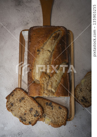 Delicious homemade banana bread sliced and ready to enjoy 135903255