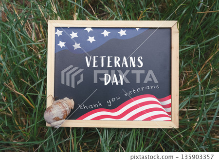 Wooden sign with a picture of an American flag Wooden sign with a picture of an American flag 135903357