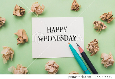 Piece of paper with the words Happy Wednesday written on it Piece of paper with the words Happy Wednesday written on it 135903359
