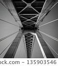 Abstract view of a modern bridge structure from below, repeating lines and symmetry, strong steel elements 135903546