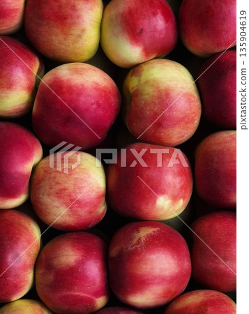 Ripe Red and Yellow Apples Background. Close-up Apple Pattern.Fresh Harvest Apples Ripe Red and Yellow Apples Background. Close-up Apple Pattern.Fresh Harvest Apples 135904619
