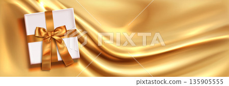 Golden silk background, white gift box, satin ribbon 135905555