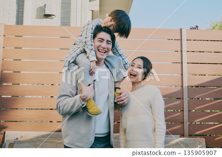 Family Parent and child carrying a shoulder 135905907