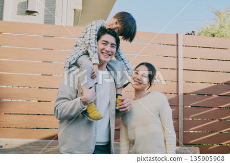 Family Parent and child carrying a shoulder 135905908