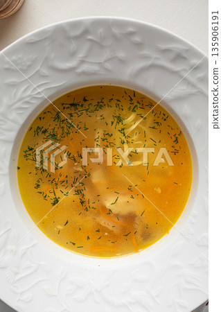 Restaurant chicken soup with herbs Restaurant chicken soup with herbs 135906191