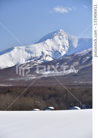 Photographing the snowy scenery of Mt. Komagatake in Mori Town, Hokkaido in winter 135906911