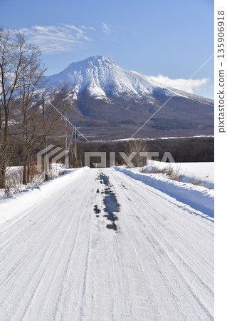 Photographing the snowy scenery of Mt. Komagatake in Mori Town, Hokkaido in winter 135906918