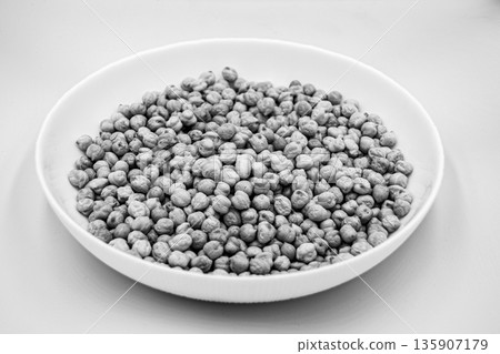 Beautiful organic dried chickpea beans consisting of raw bengal legume pea Beautiful organic dried chickpea beans consisting of raw bengal legume pea 135907179