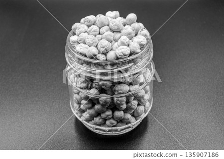 Beautiful organic dried chickpea beans consisting of raw bengal legume pea 135907186