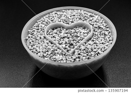 Organic dry buckwheat grains consisting of raw natural product 135907194