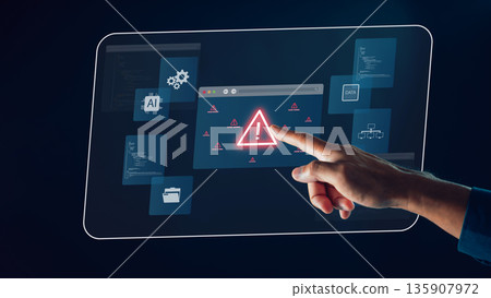 Cybersecurity risk alert displays digital threat as hand touches glowing red system warning icon on futuristic screen showing data security information and AI technology for safety Cybersecurity risk alert displays digital threat as hand touches glowing red system warning icon on futuristic screen showing data security information and AI technology for safety 135907972