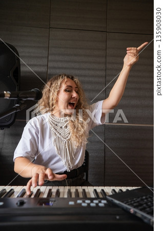 Caucasian woman teaches online music lesson..  135908030